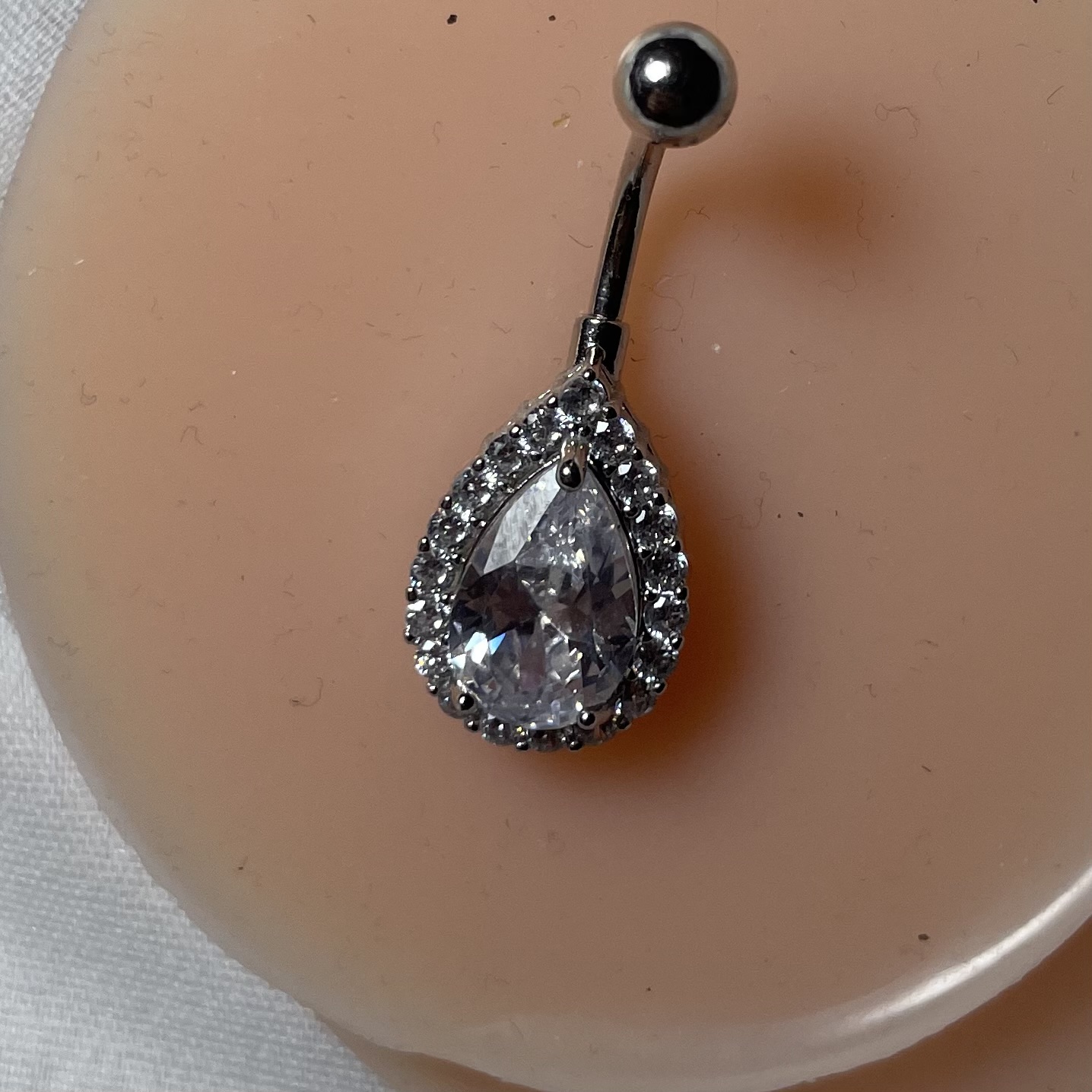 پیرسینگ ناف نگین اشکی